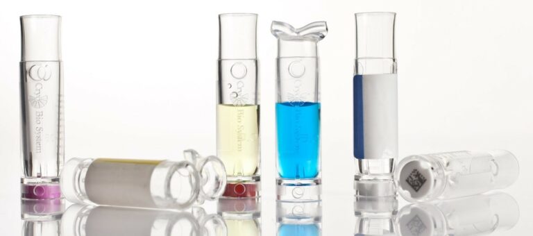 A picture displaying laboratory vials filled with colourful liquids.