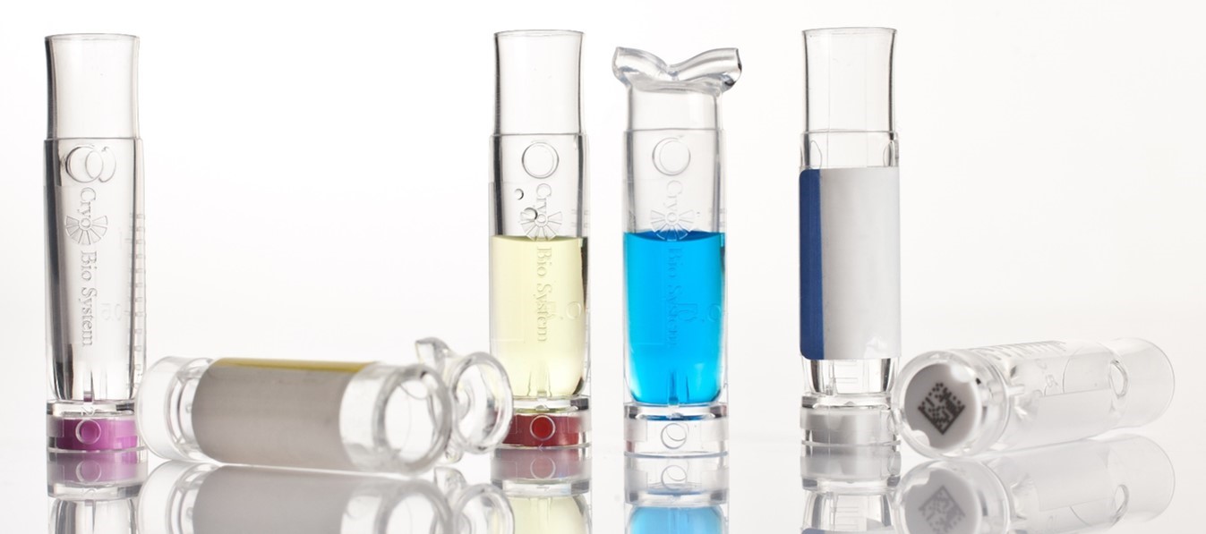 A picture displaying laboratory vials filled with colourful liquids.